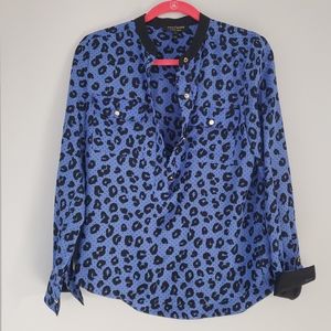 Juicy Couture blue and black blouse.
